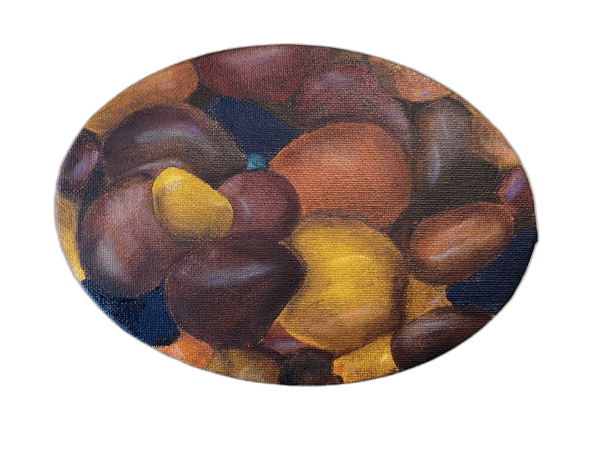 Oval canvas with stones in amber, purple, and ochre tones